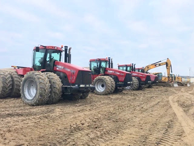 A fleet of agriculture equipment recently appraised by a heavy equipment appraiser